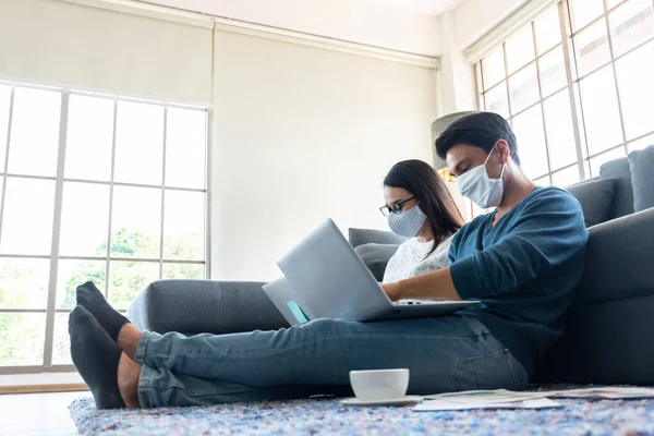 Couple Wearing Surgical Mask Work Home Lock Corona Virus Outbreak Royalty Free Stock Photos