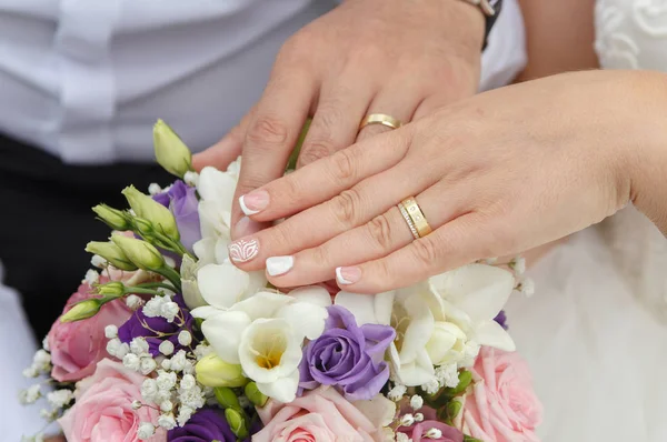 Wedding concept ( young married couple holding hands,)