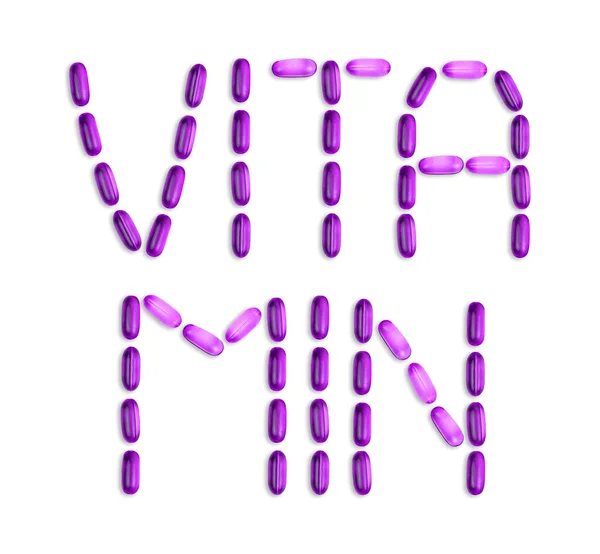 La parola Vitamina è strutturato con pillole. La parola Vitamina è lai — Foto Stock