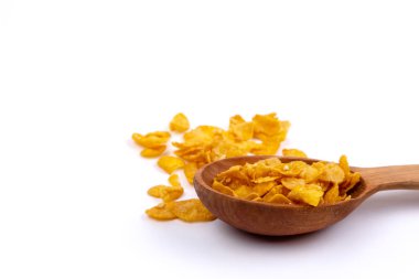 Çıtır mısır gevreği, tahıl gevreği, ahşap kaşıkta müsli yığını...