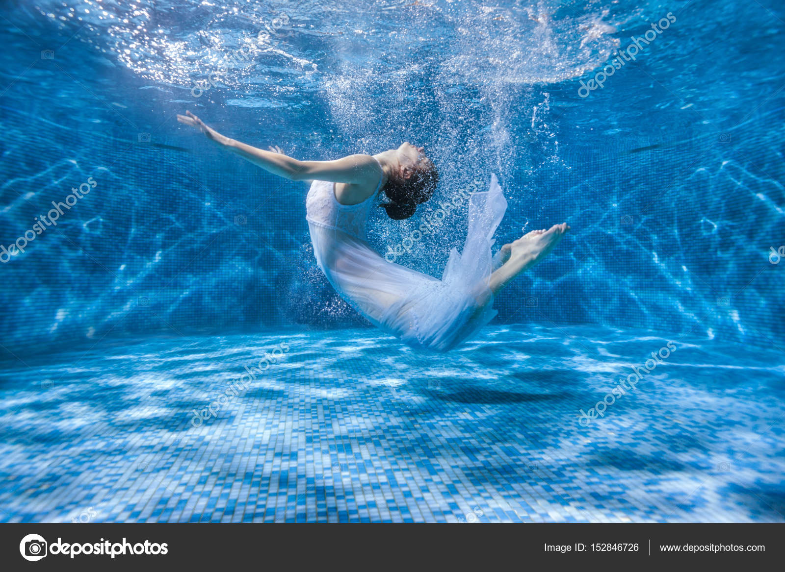 Woman is a mermaid underwater. Stock Photo by ©kladyk 152846726