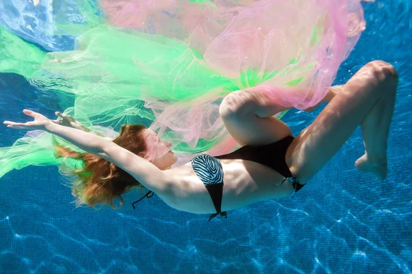 Woman in water with fabric. — Stock Photo, Image