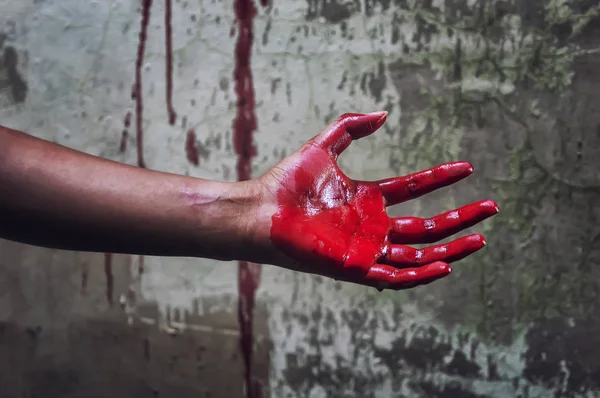 Horror Scene with Bloody Hand in an abandoned house them.The sto — Stock Photo, Image