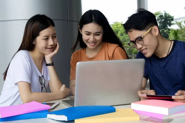 Group of young asian studying in university sitting during lectu — Stock Photo, Image