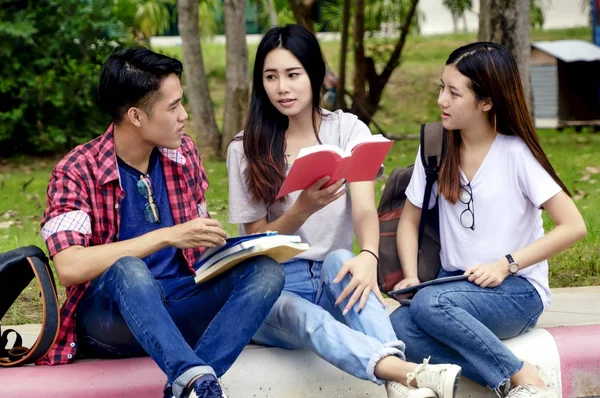 Group of young asian studying in university sitting during lectu