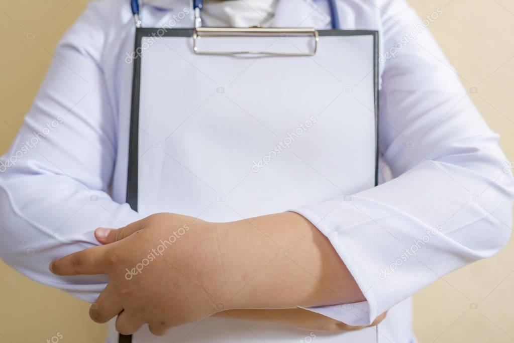 Man doctor holding application form.