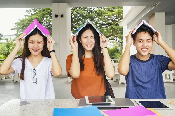 Group of young asian studying in university sitting during lectu — Stock Photo, Image
