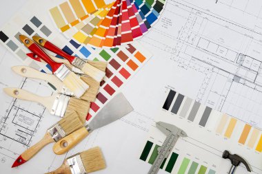 Professional decorator using a digital tablet, work tools. clipart