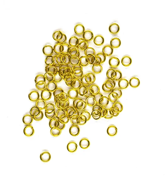 Güzel altın tokalar, yıldızlar, beyaz arka planda izole edilmiş çeşitli saç şekilleri. el yapımı mücevherler