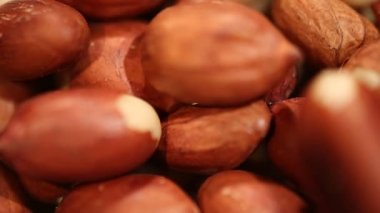 Kavrulmuş fıstık döner, baklagil yağ ve besinlerin, yerfıstığı closeup zengin