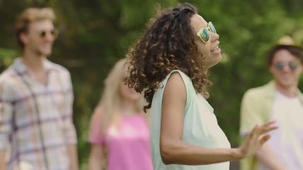 Confident mixed race girl shaking head, actively dancing at talent show, slow-mo — Stock Video