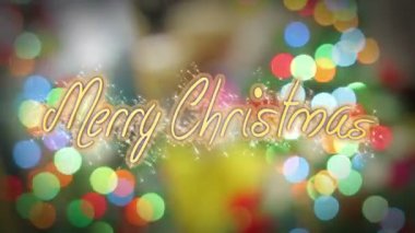 Neşeli Noel tebrik kutlama mesajı parlak renkli arka plan üzerinde