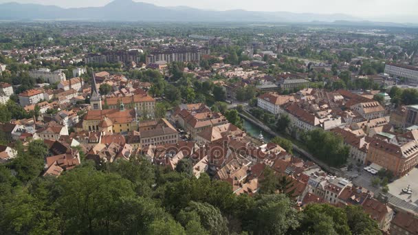 Aerial view of Ljubljana, capital of Slovenia, red roofs of old European city — Stock Video