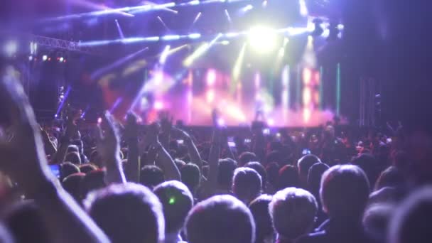 People jumping and waving hands, enjoying favorite music and songs at concert — Stock Video