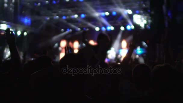 Hands of excited audience enjoying good music, watching performance on stage — Stock Video