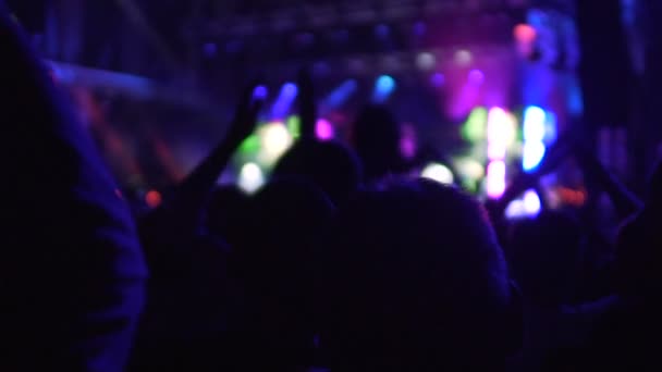 Concert hall crowded with excited audience, people applauding to popular singer — Stock Video