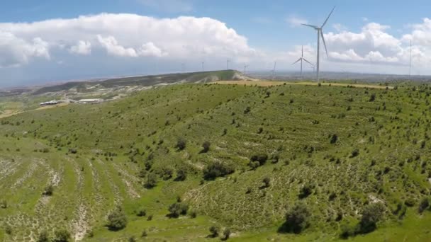 Modern wind turbines surrounded by beautiful nature, green energy generation — Stock Video