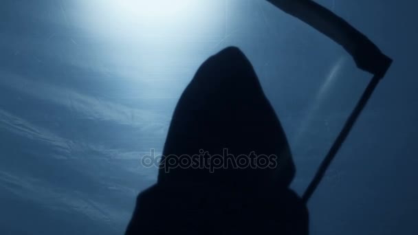 Silhouette of inevitable death with scythe, life of senior person coming to end — Stock Video