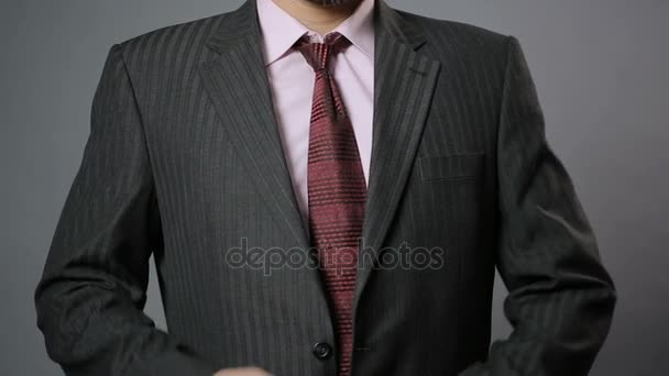 Relaxed office worker taking black jacket off after hard working day, closeup — Stock Video