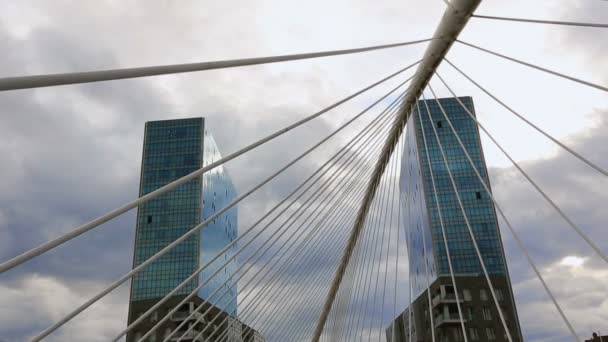 Two tall office skyscraper buildings standing opposite each other in Bilbao — Stock Video