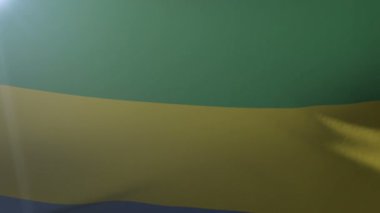 Gabon bayrak direğine rüzgarda, özgürlük'ın ulusal sembolü sallayarak bayrak