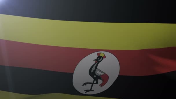 Bandiera dell'Uganda sventola sul pennone del vento, simbolo nazionale della libertà — Video Stock