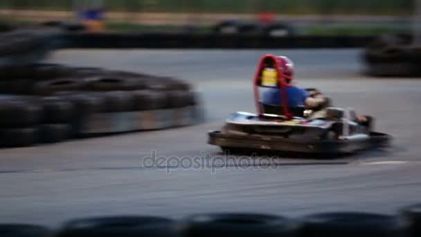 Active man enjoying speed at kart racing, having fun at karting club, male hobby — Stock Video