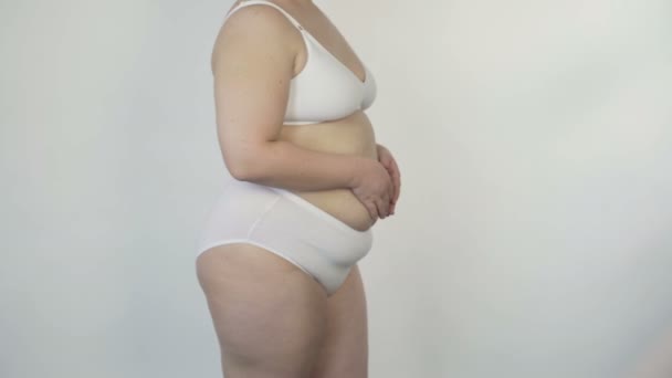 Self-confident plus size model posing for camera, overweight, body content — Stock Video