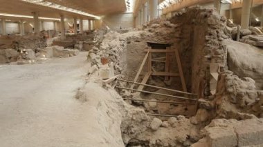 Akrotiri kazı evinde imha önlemek yapılan yapılar destekleyen