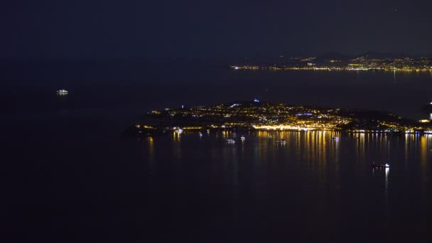 Night view of Monaco harbor, venue for international yacht shows, aerial shot — Stock Video