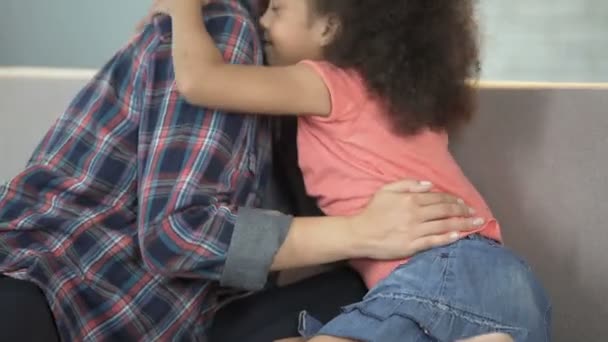 Biracial girl hugging mother, rejoicing that finally found her, adoption system — Stock Video