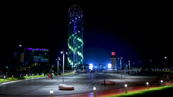 Alphabetic tower beautifully lit at night, spending summer in Georgia, Batumi — Stock Video