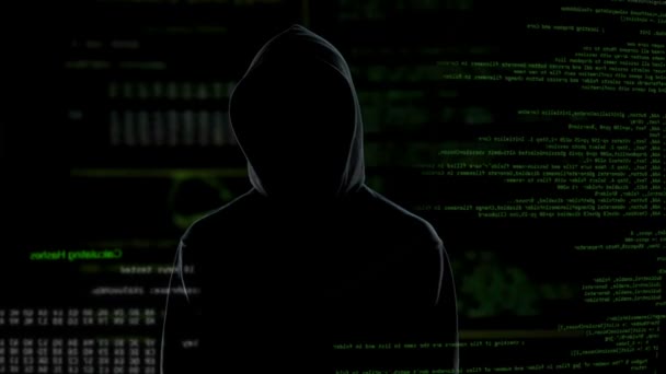 Безликий мужчина-хакер дистанционно активирует бомбу нажатием кнопки, терроризмом — стоковое видео