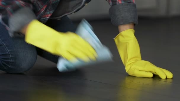 Tired maid gloves wiping floor after corporate party, low paid work, occupation — Stock Video