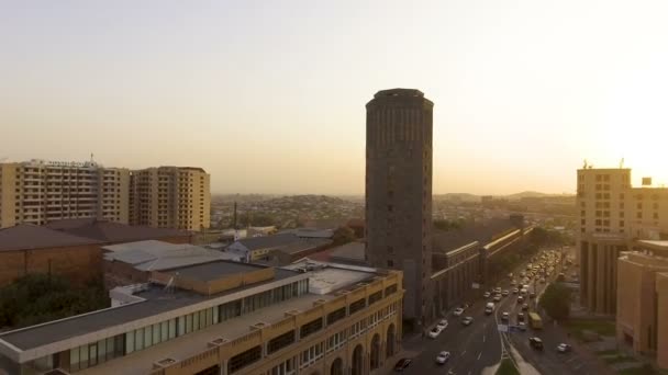 View from quadrocopter to vehicles movement near Yerevan City Hall, golden hour — Stock Video