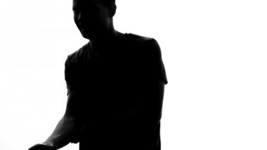 Dirseğini tutan, eklem iltihabı, spor yaralanma duygu atlet erkek gölge