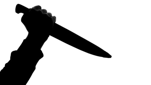 Close up of serial killer hand holding blooded knife, horror and crime, thriller — Stock Video