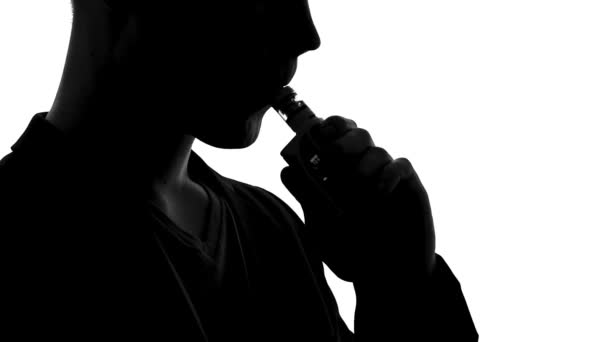 Vaper silhouette exhaling smoke of e-cigarette, bad habits and addiction, device — Stock Video