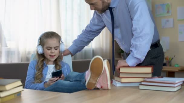 Disobedient Girl Headphones Listening Music Smartphone Ignoring Dad — Stock Video