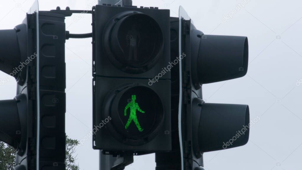 Green traffic light at crossroads, grant permission, project accept, new startup