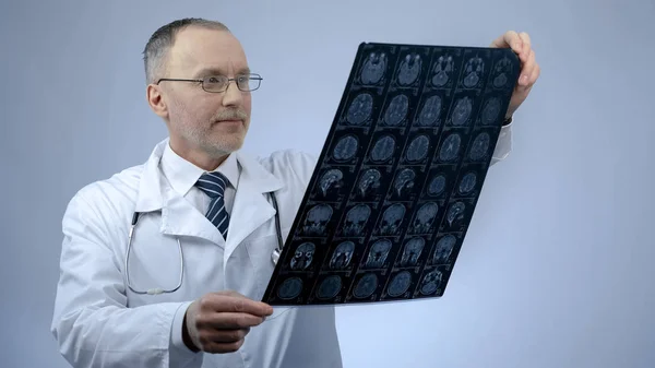 Happy Smiling Doctor Checking Mri Brain Scan Satisfied Treatment Results — Stock Photo, Image