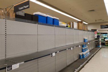 Coles süpermarketi boş tuvalet kağıdı rafları Coronavirüs korkuları ve panik satın alma arasında