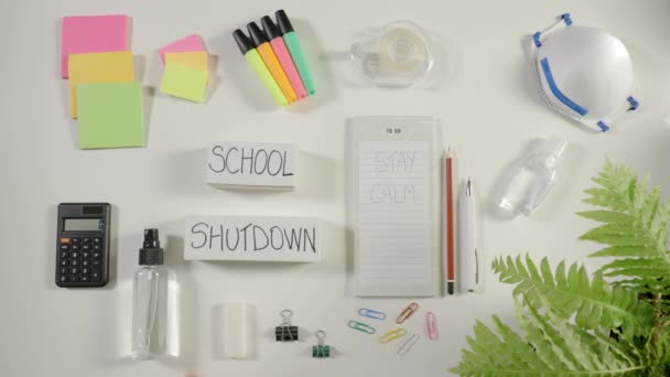 Caronavirus School Shutdown Konzept Desinfizierender Taschenrechner Schreibwaren Auf Weißer Flacher — Stockvideo