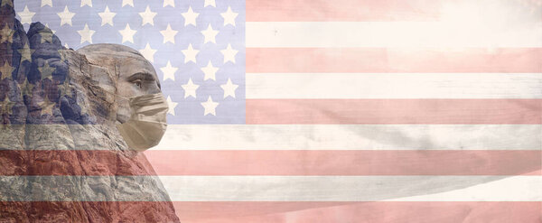 George Washington sculpture with medical mask Mount Rushmore National Monument with american flag background