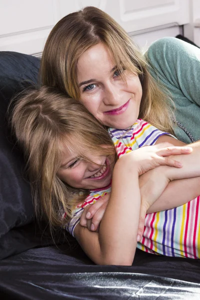 Little girl with mom together — Stock Photo, Image