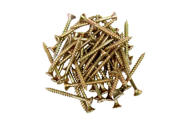 Gold-colored screws — Stock Photo, Image