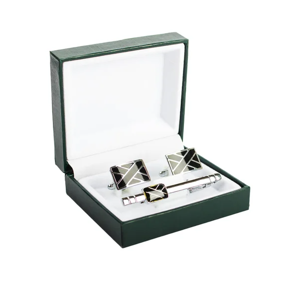 Cuff links in a box on white background Stock Picture