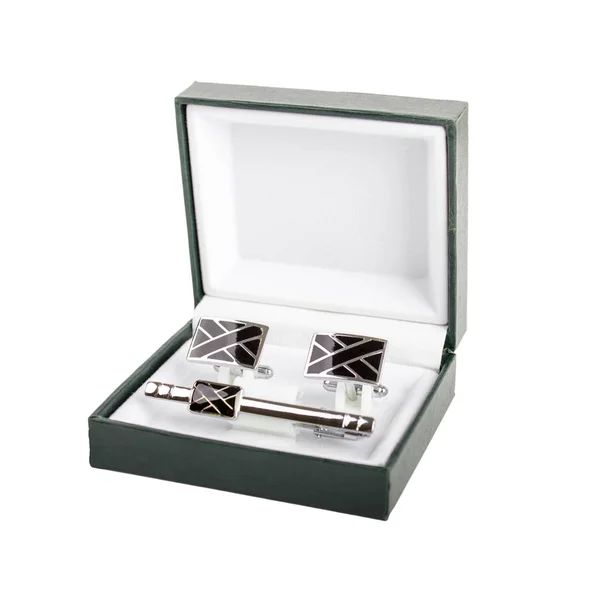 Cuff links in a box on white background Stock Picture