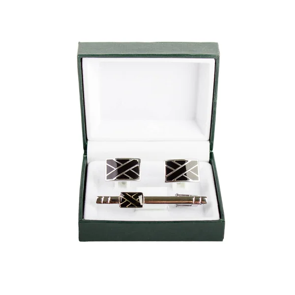 Cuff links in a box on white background Stock Picture