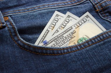 Kot pantolon cebinde para. İş kavramı. cep harçlığı.